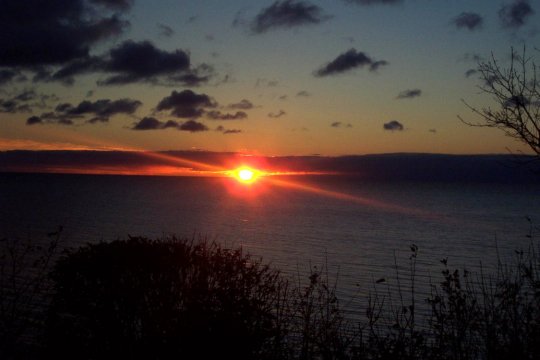 AN AWESOME SUNSET OVER LAKE WINNIPEG, OCT. 23, 2002