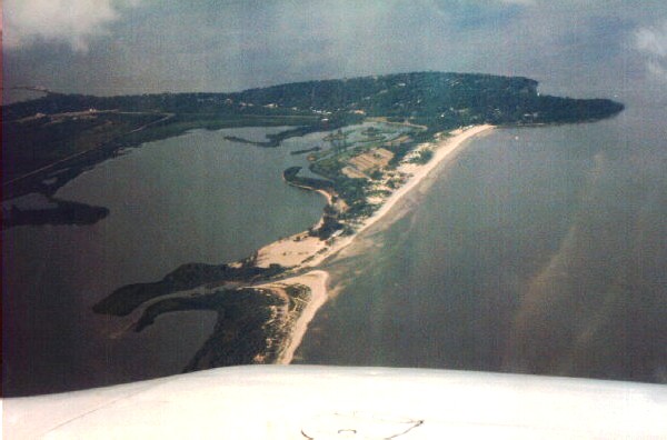 TRAYCE AND LARRY FLYING OVER GRAND BEACH 1999