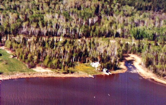 OVER THE NORTH SHORE OF THE MANIGOTAGAN RIVER