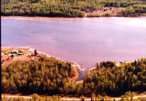 THE SOUTH SHORE OF THE MANIGOTAGAN RIVER - TOP OF SCREEN